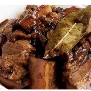Jamaican  brown  stew belly Pork served with your choice of Rice dishes  - serves two
