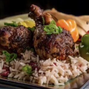 Jamaican oven style Jerk chicken served with your choice of rice dish -  serves two