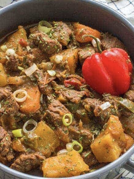 Jamaican  stew beef  with your choice of rice dish –  serves two