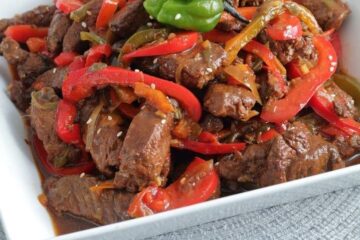 Jamaican  peppered steak served with your choice of rice dish –  serves two