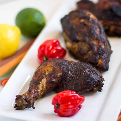 Jamaican oven style Jerk chicken served with your choice of rice dish –  serves two