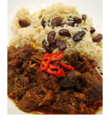 Jamaican  lamb curry served with your choice of rice dish –  serves two