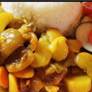 Jamaican  cow tripe “Shaki’  and beans served with  a choice of rice dishes , serves two