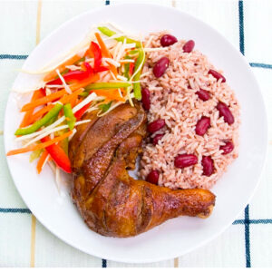 Jamaican oven style Jerk chicken served with your choice of rice dish -  serves two
