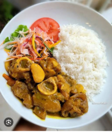 Jamaican curried cow foot  served with  a choice of rice dish – serves two