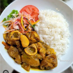 Jamaican curried cow foot  served with  a choice of rice dish - serves two