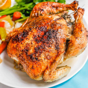 Jamaican oven roast whole chicken served with  a choice of rice dishes - serves two