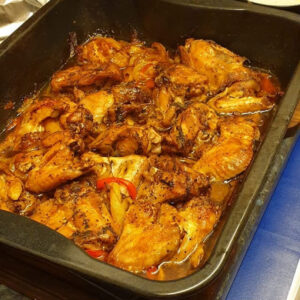 Jamaican oven roast chicken Pieces served  with a choice of Rice dishes - serves two