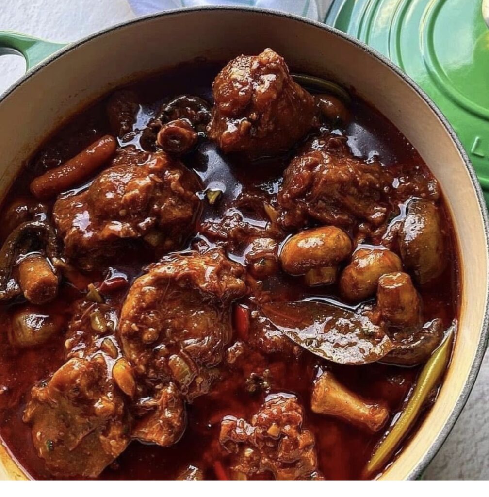 Jamaican  Jerk BBQ Oxtail Caserole served with your choice of Rice dish – serves two