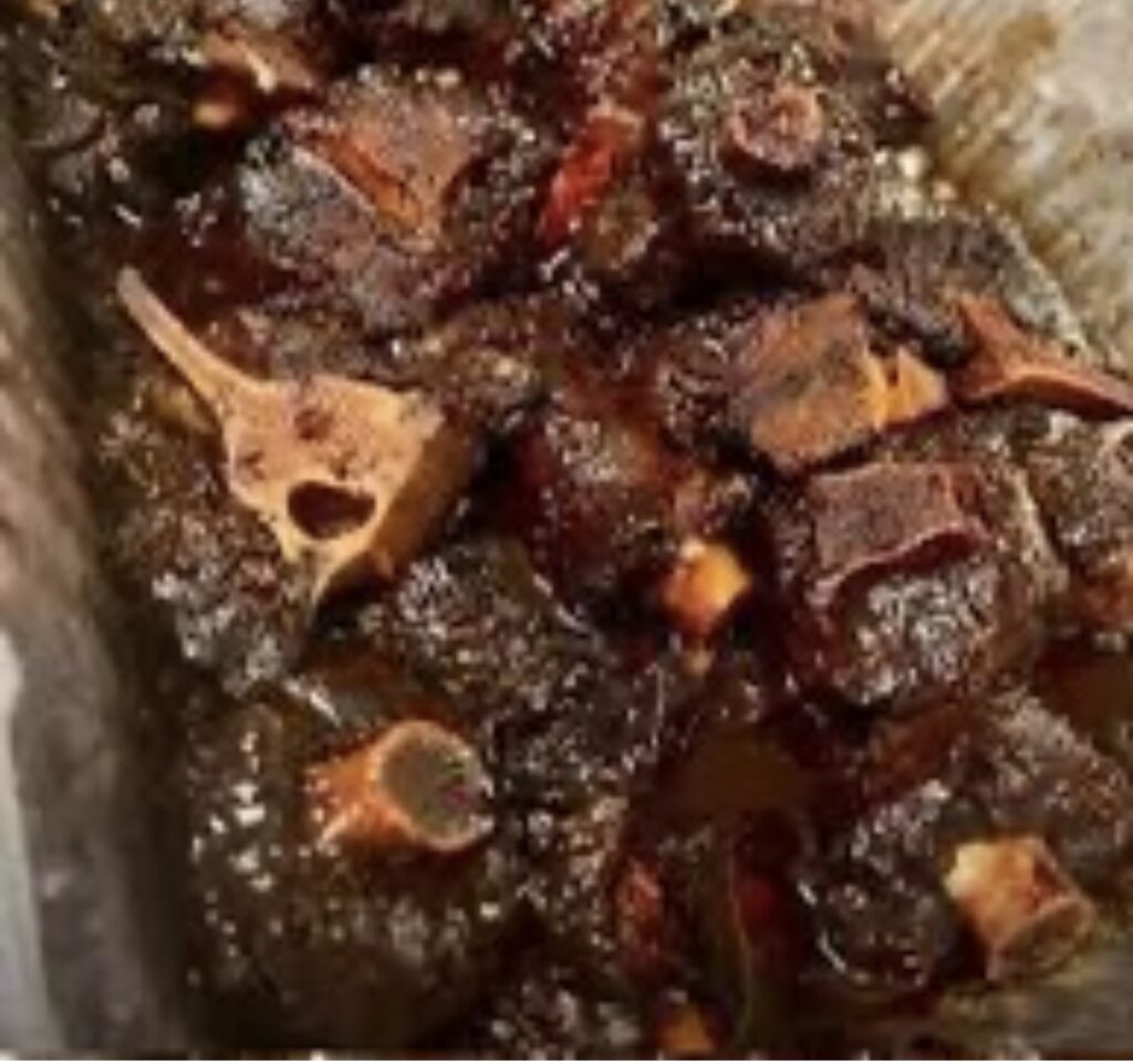Jamaican  Jerk BBQ Oxtail served with your choice of Rice dish – Serves two