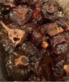 Jamaican  Jerk BBQ Oxtail served with your choice of Rice dish – Serves two