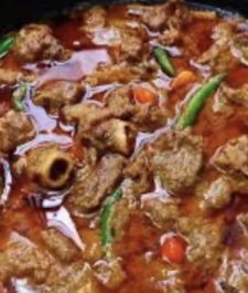 Jamaican Stewed Mutton  served with your choice of rice dishes – serves 2