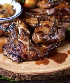 Jamaican oven style  BBQ Jerk chicken  served with a choice of Rice dish –  serves two