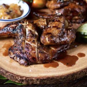 Jamaican oven style  BBQ Jerk chicken  served with a choice of Rice dish -  serves two